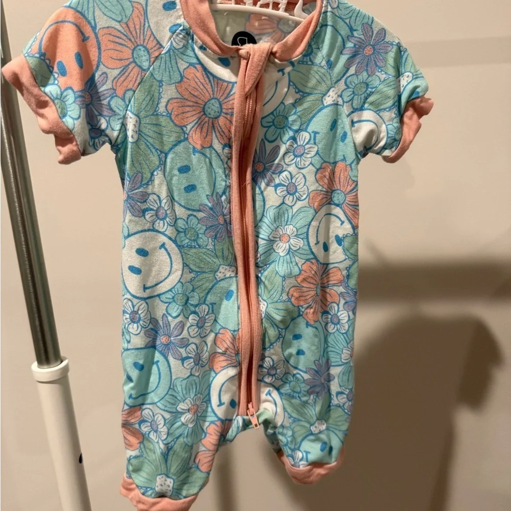 Bamboo Floral Smiley zippy romper